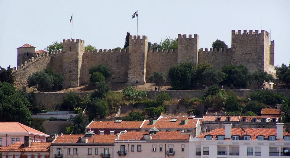 Discover dramatic castle views rising above charming rooftops.