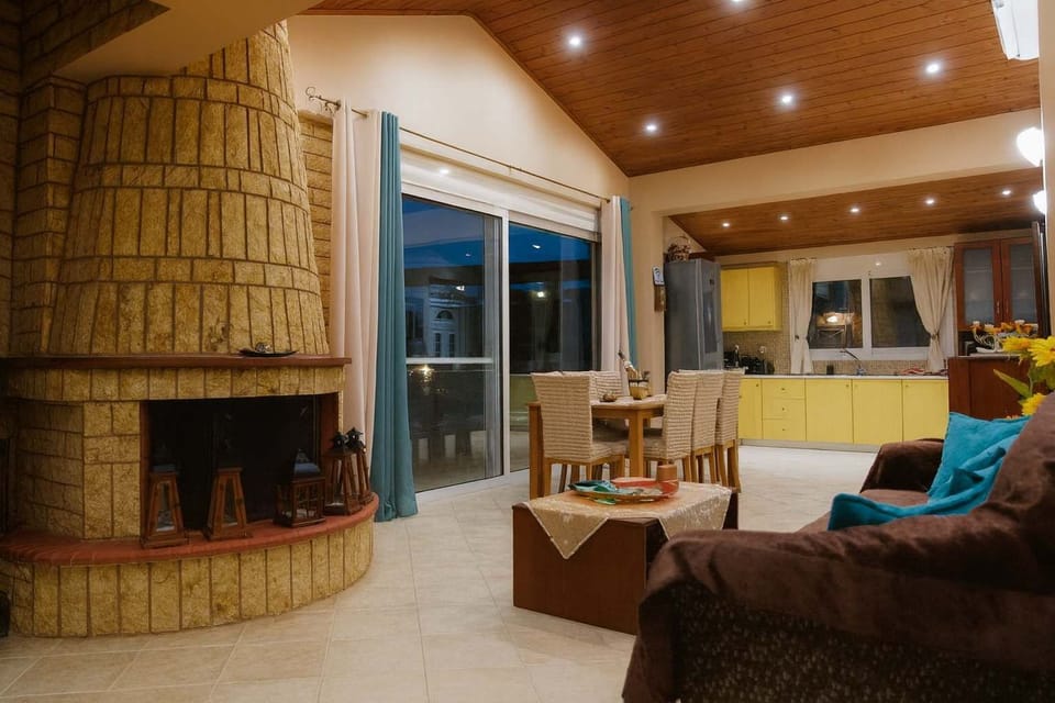 Bright and cozy living room with large windows.