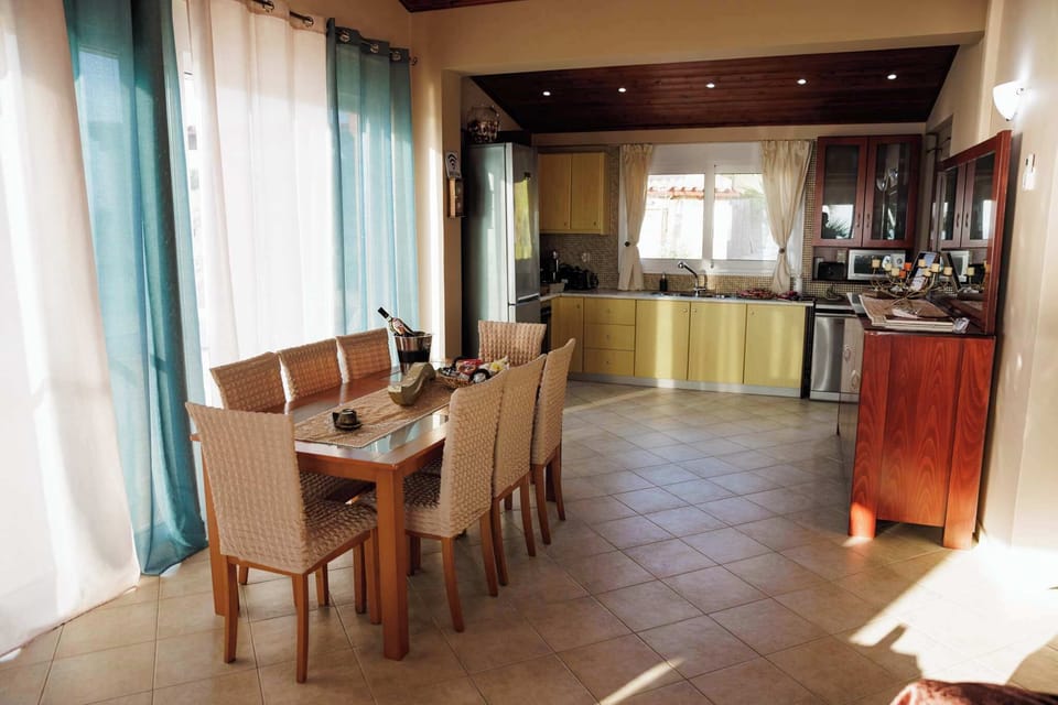 Open-plan kitchen with dining area.
