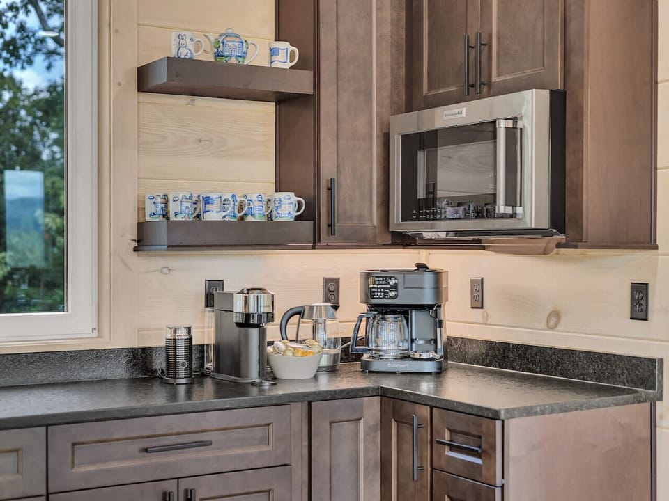 Begin your mornings at the fully stocked coffee bar, where you can choose between a fresh pot or single cup as the mountains wake outside.