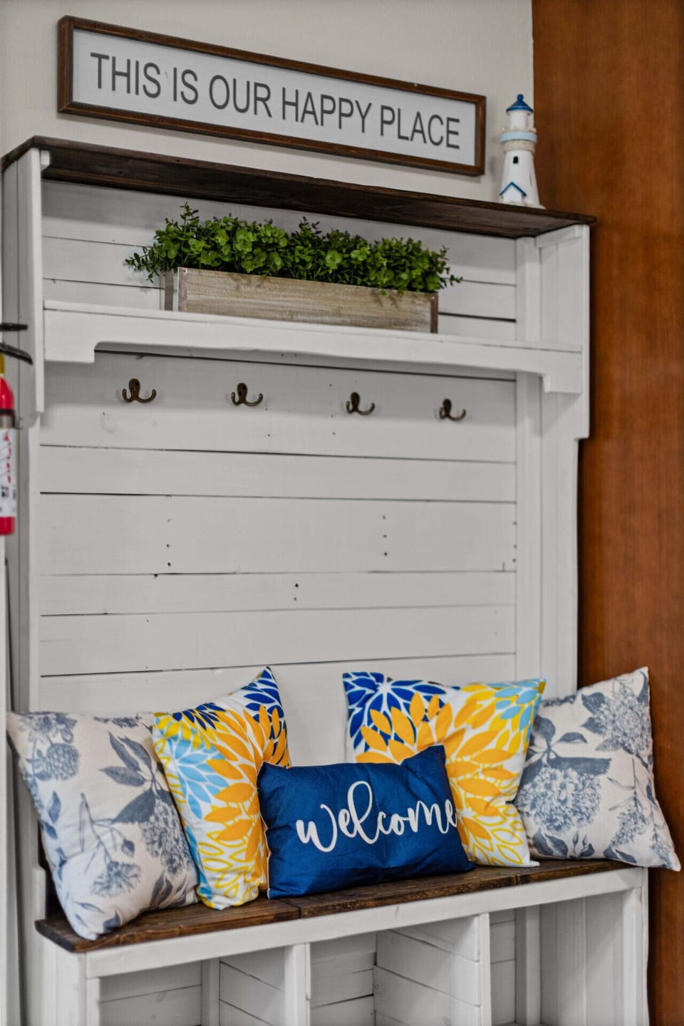 A cheerful welcome bench sets the tone for your stay—drop your bags, hang your coats, and feel at home.