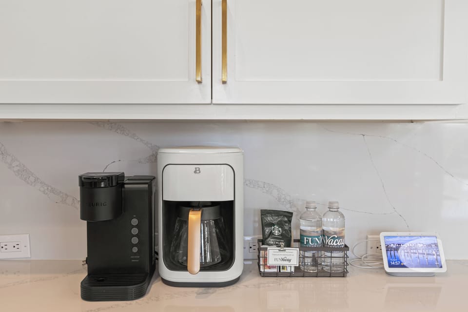 Wake up to fresh coffee with your Keurig and drip maker, plus complimentary treats and water to start your day right.