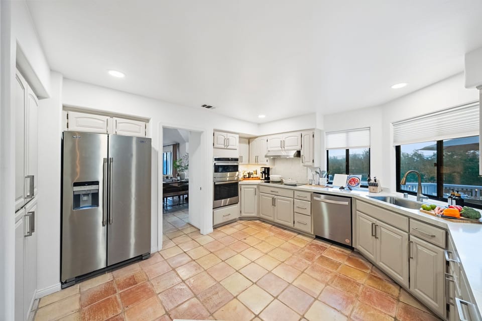 Nicely separated from the dining area so the dishes can wait