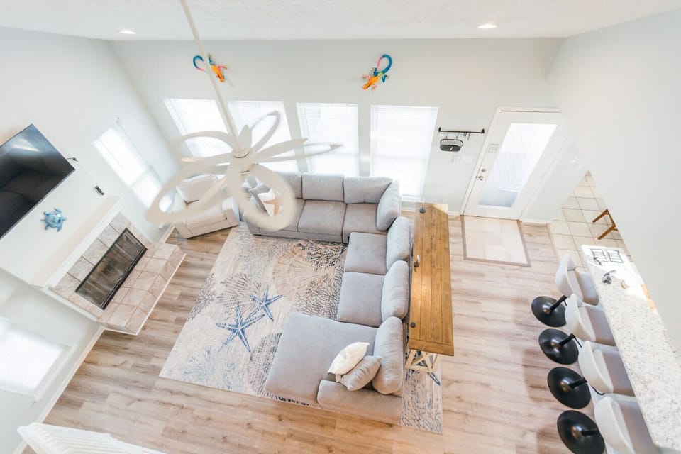 A view of the living room from the second floor landing