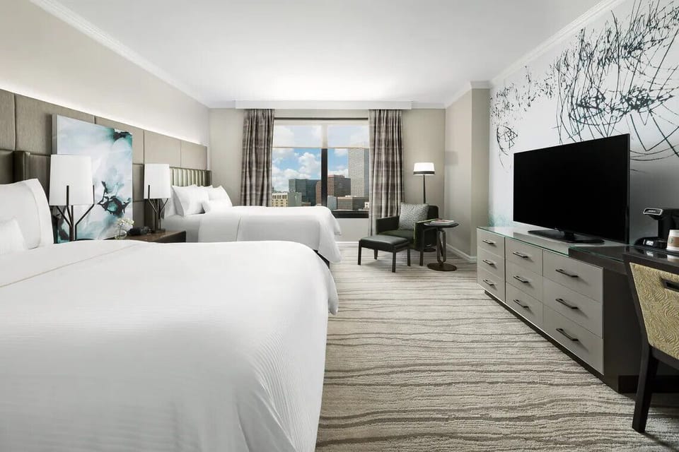 Wake up to city views and stretch out on plush beds.