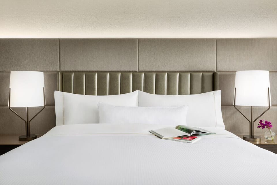 Sink into crisp linens and drift off in quiet comfort.
