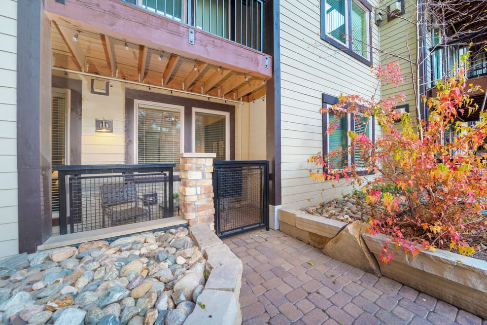 Private patio with direct access to the amenity deck + hot tub