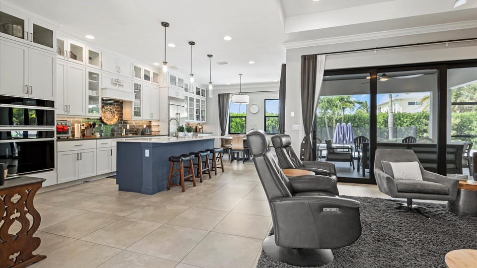 The kitchen opens to the living room to enjoy time with family and friends in one space.