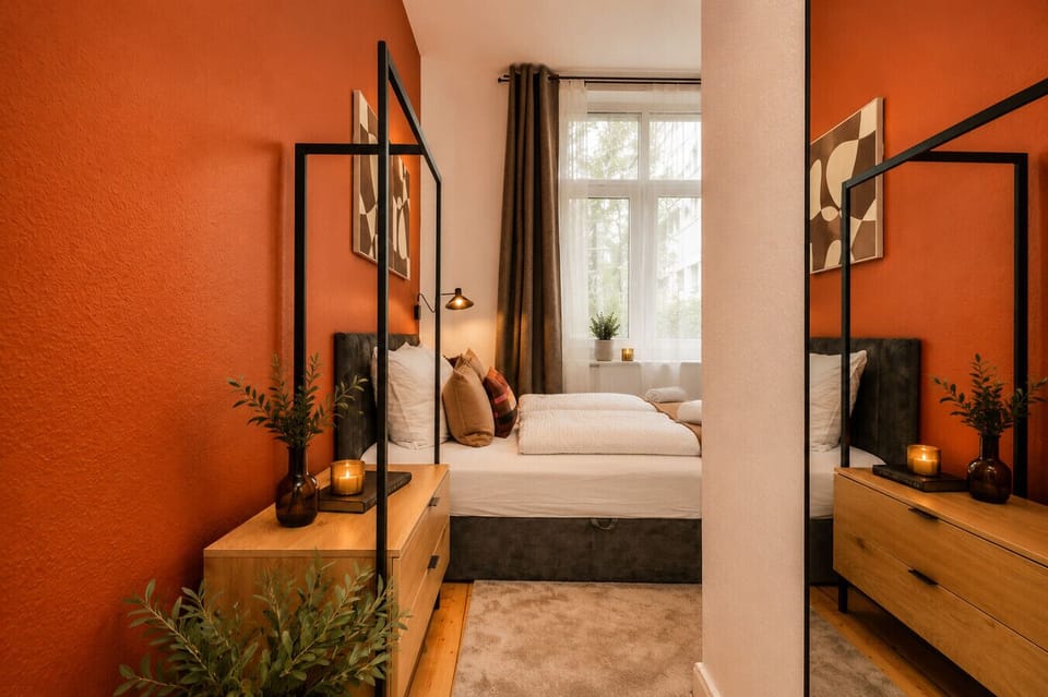 Enjoy a beautifully designed bedroom space with modern furnishings, comfortable bedding, and a bright window that fills the room with natural light throughout the day.