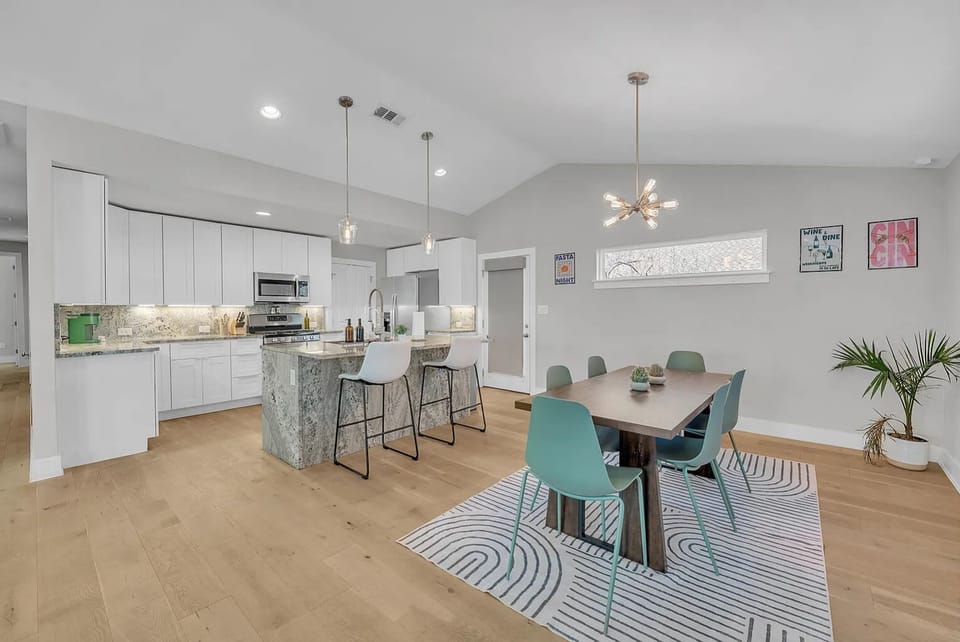 Dining area for 6 with additional bar seating and full kitchen