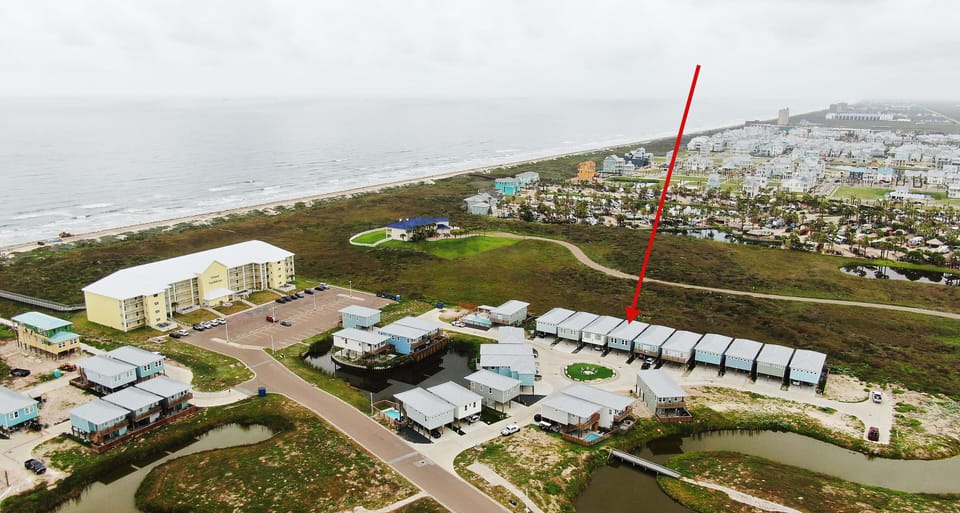 Get a bird’s-eye view of the neighborhood, with an arrow highlighting the perfect spot where your getaway awaits. (The Madison)