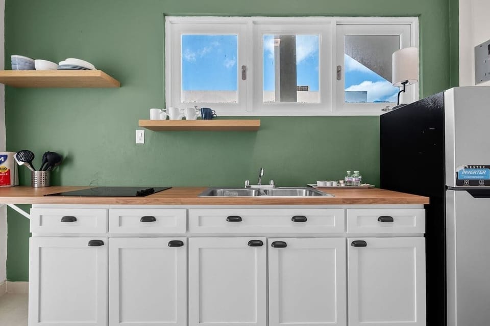 Prepare a meal with ease in this well-equipped kitchen.

