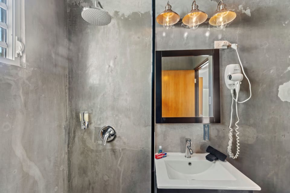 Sleek, modern bathroom with all essentials.

