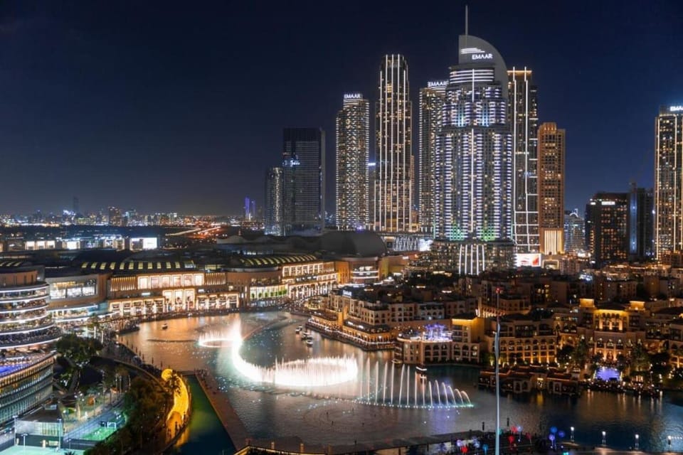 Gaze out into the heart of Downtown Dubai as the night skyline shines bright.