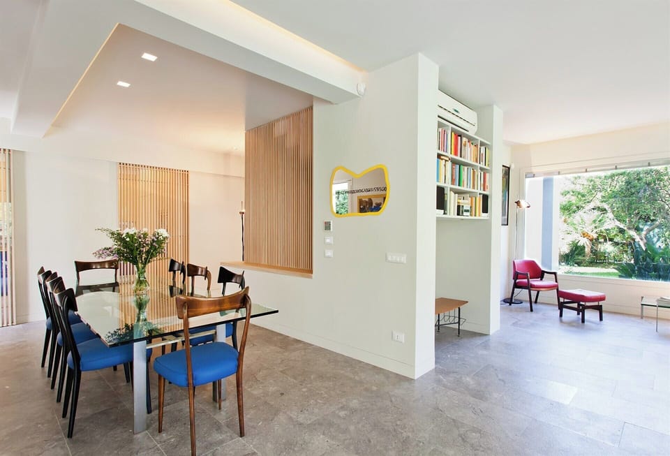 The indoor dining area looking towards the kitchen.