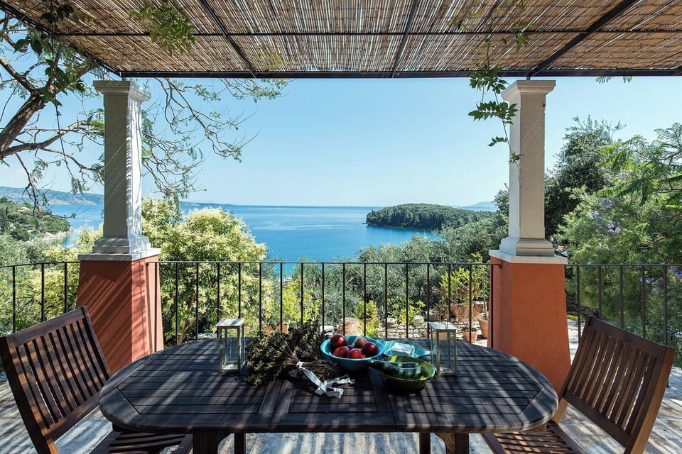 The main dining terrace overlooks the pool and the sea.