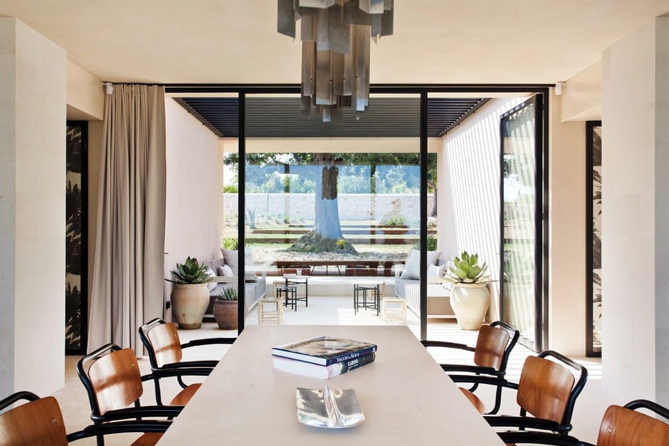 Views from the indoor dining area out to the gardens surrounding the property.