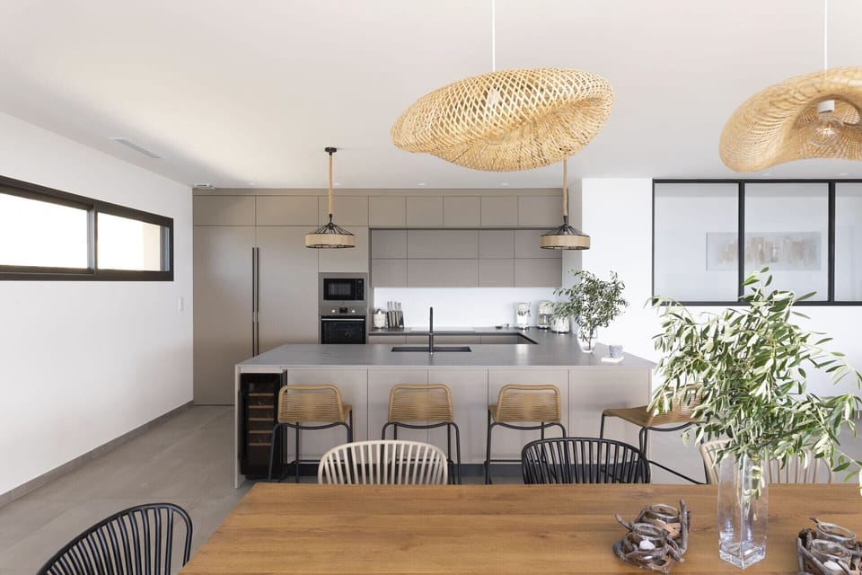 The sleek, well equipped kitchen.