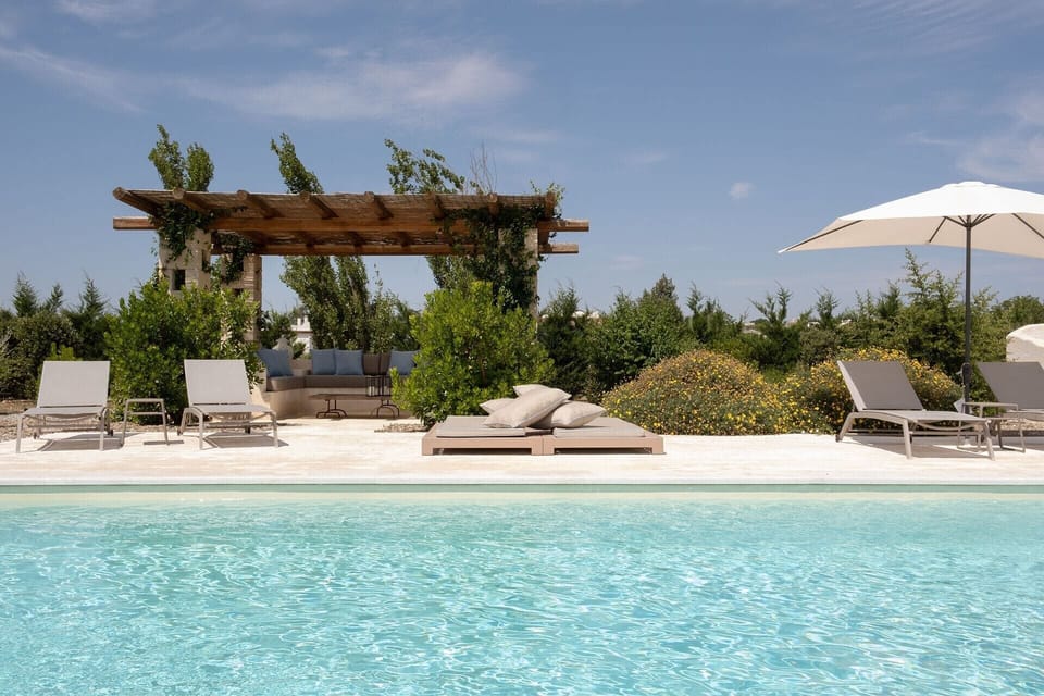 The shady al fresco sitting area by the pool.