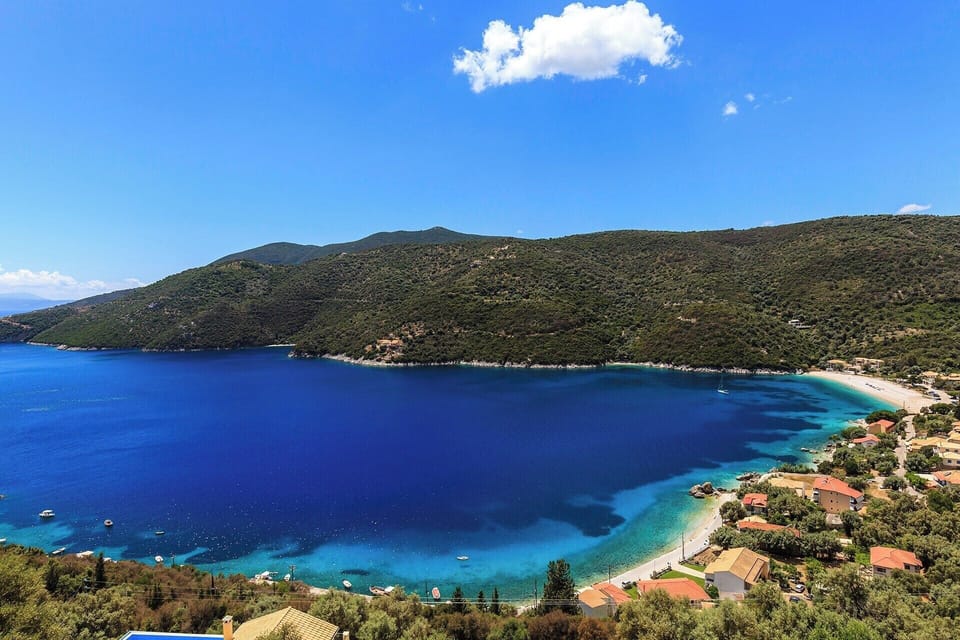 The stunning colours of the beach and bay of Mikros Gialos.
