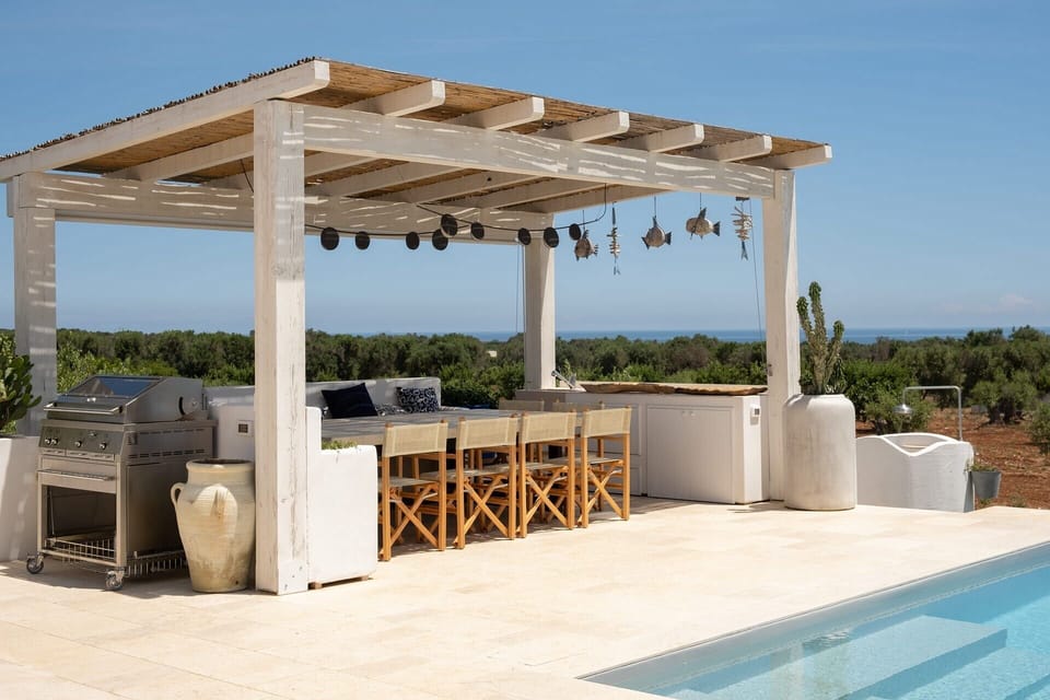 The shaded al fresco dining area by the pool.