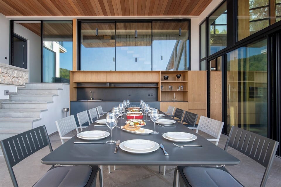 The dining area outside the kitchen is extremely well-appointed. 