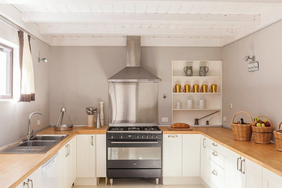 The well-equipped, luminous kitchen in the main house.