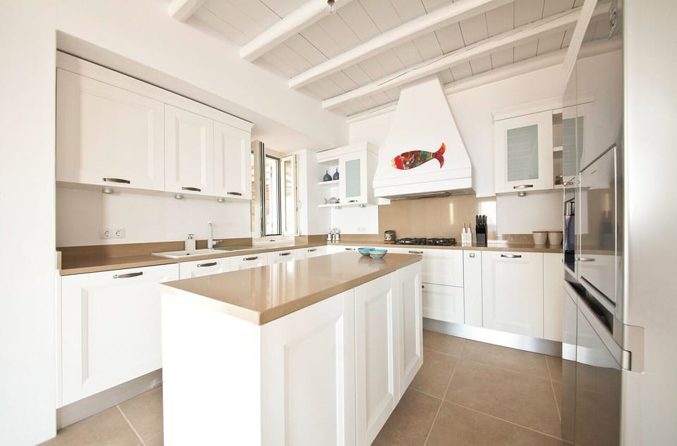 The well-equipped modern kitchen in the first house.
