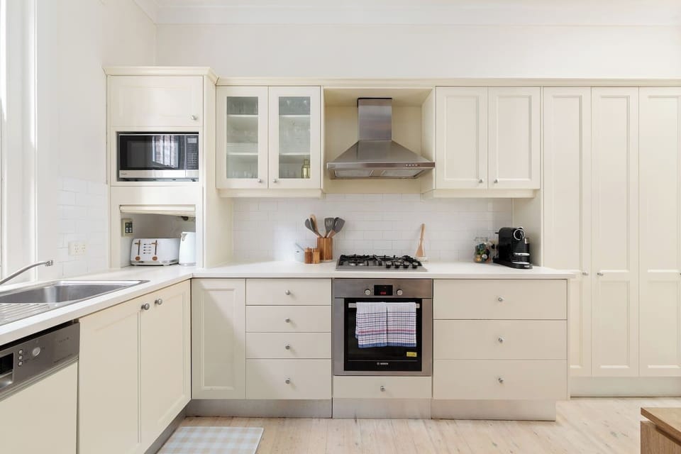 Prepare meals in the well-appointed kitchen with a gas cooktop, oven, dishwasher, microwave, and Nespresso machine for barista-style mornings, plus all the appliances needed for home-cooked meals or breakfast smoothies.