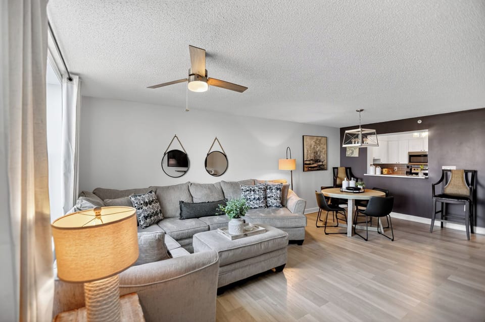 Open Concept Living Area, Dining Area, And Breakfast Bar