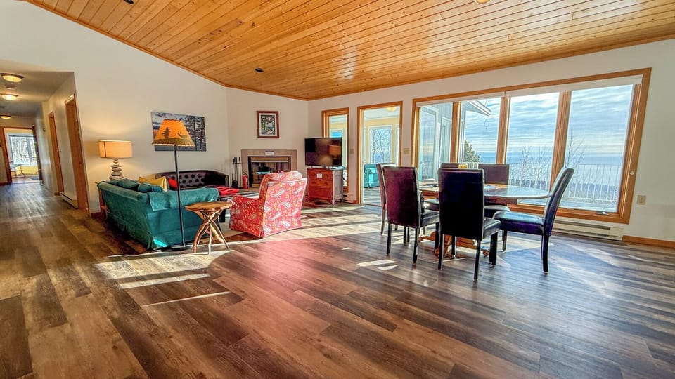 Open layout living area includes the kitchen, living room, and dining room.