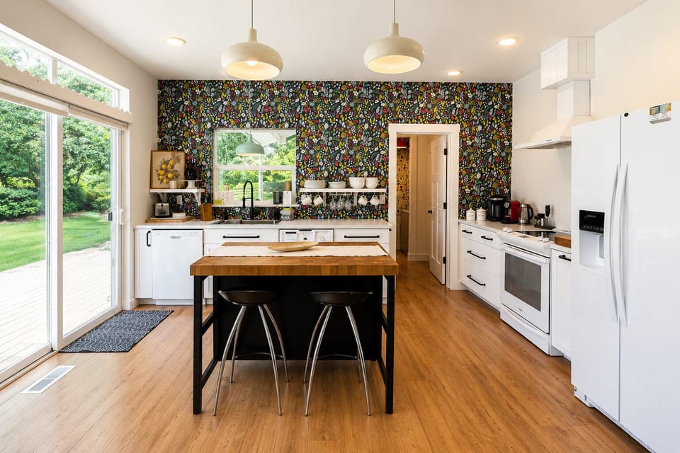 Full Kitchen includes eat up bar with stools, dishwasher and coffee station.