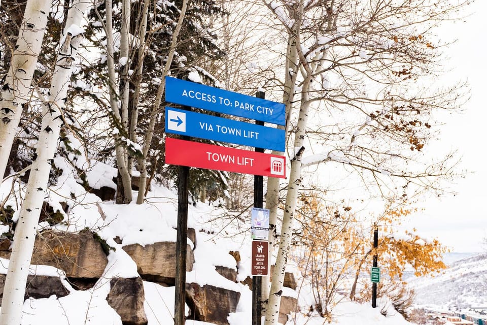 Signs nearby the home providing directions to the nearby Park City Mountain Town Lift.