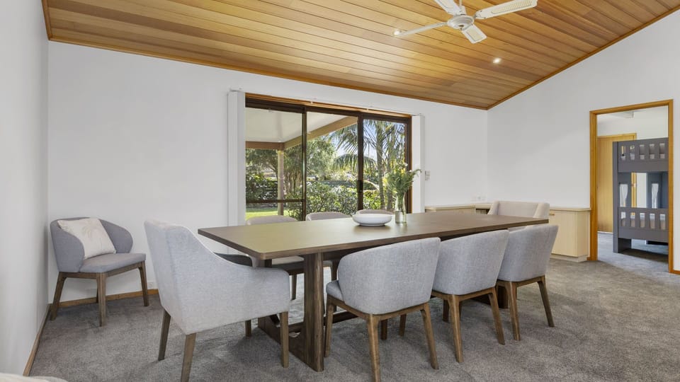 Dining room with access to the alfresco area via sliding doors. 