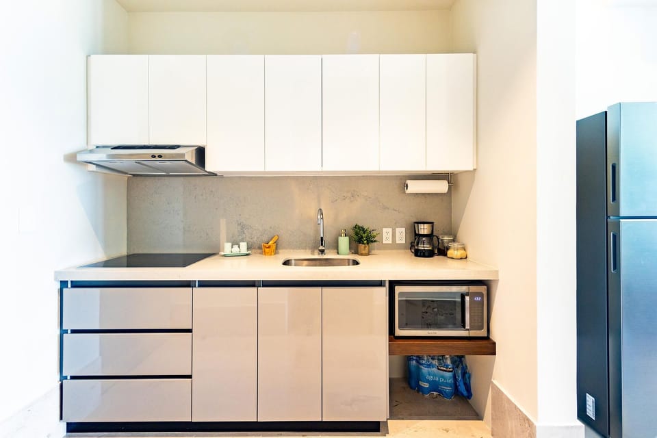 Stovetop, full-size fridge, and all the essentials including coffee to start your morning!tart your morning