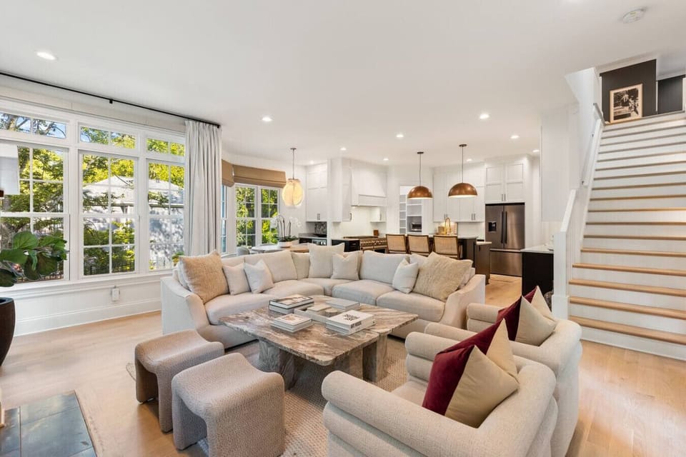 A second living room, located off of the kitchen. Includes a Smart TV and a gas fire place.