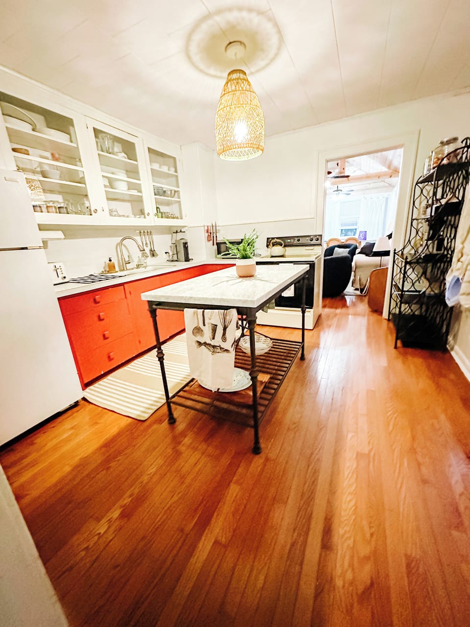 Kitchen with marble Crate & Barrel island for eating at or serving buffet style.