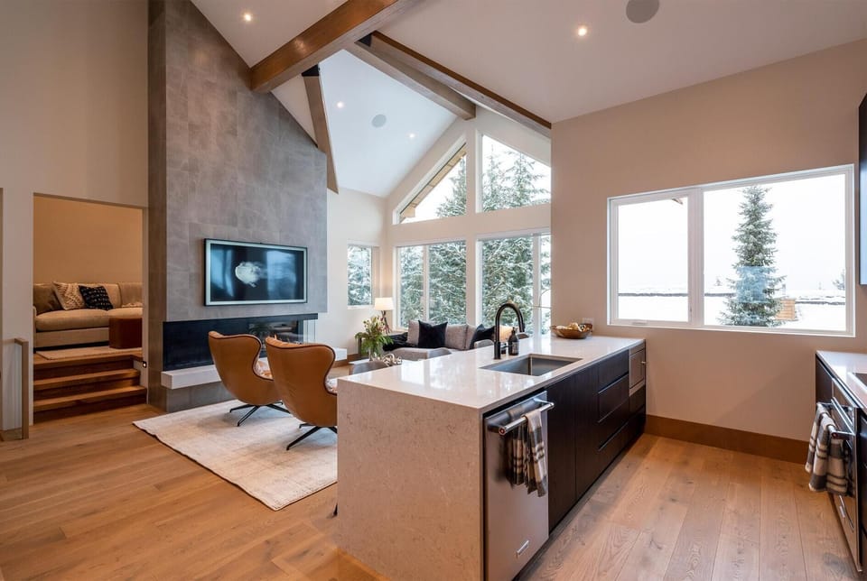 Open concept living, kitchen area that is bright and comfortable for entertaining or relaxing