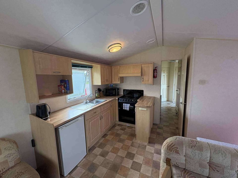 the kitchen is equipped + microwave +coffee maker