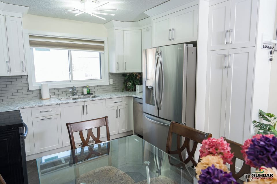 Large size fridge in kitchen. 