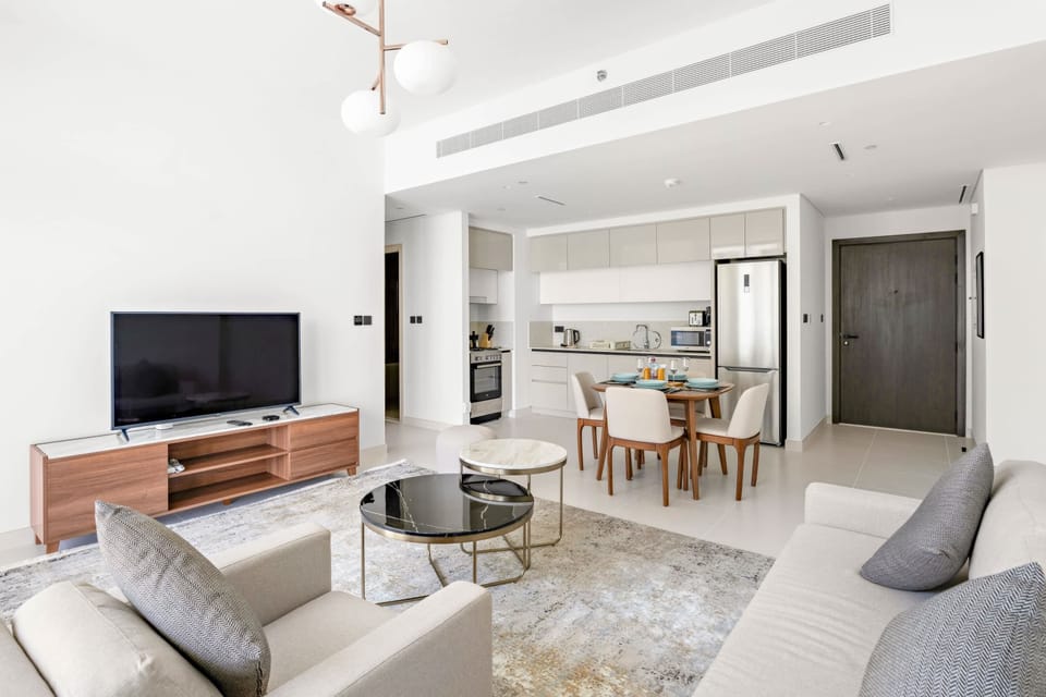 Relaxed sitting space filled w/ natural light.