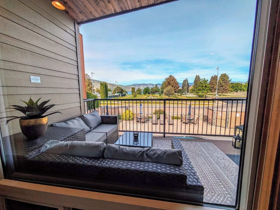Soak up the pool, park, and make views from anywhere in the living room. 