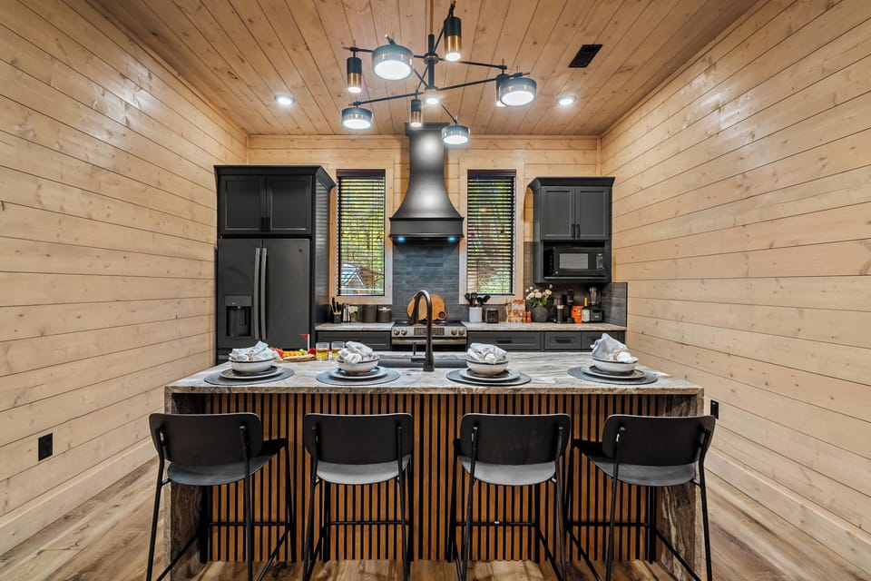 Modern kitchen island with seating — perfect for meals and gatherings.