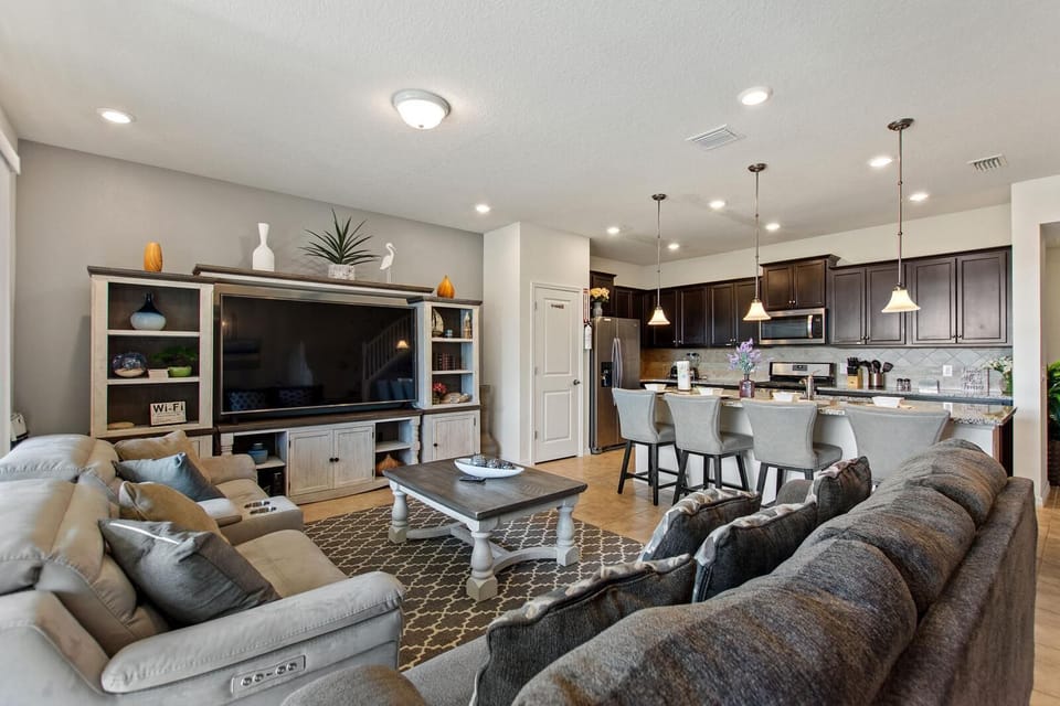 Unwind in a warm living area featuring soft lighting and a welcoming atmosphere.