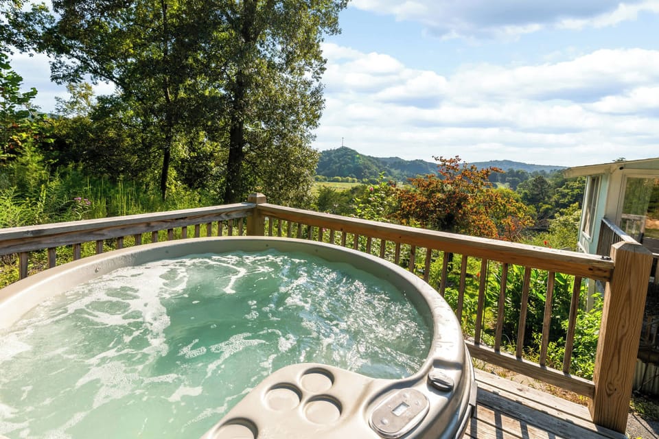 Private hot tub with panoramic ridge views