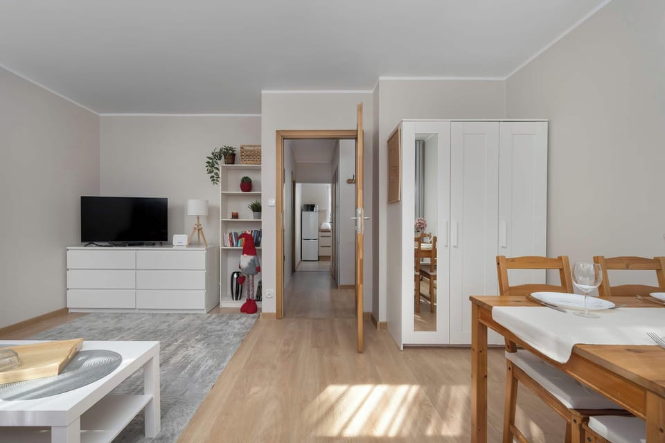 The bedroom's tasteful decor combines functionality with elegance.