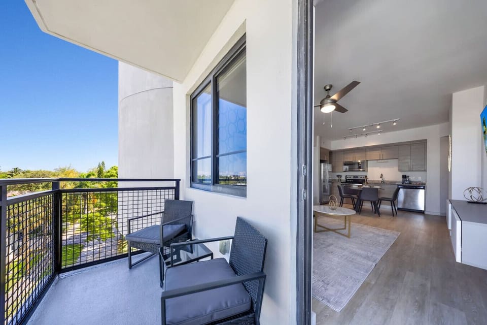 Private Balcony Retreat-Cozy outdoor seating area with open views, seamlessly connected to the living and dining space. Perfect spot to enjoy fresh air, morning coffee, or evening relaxation.