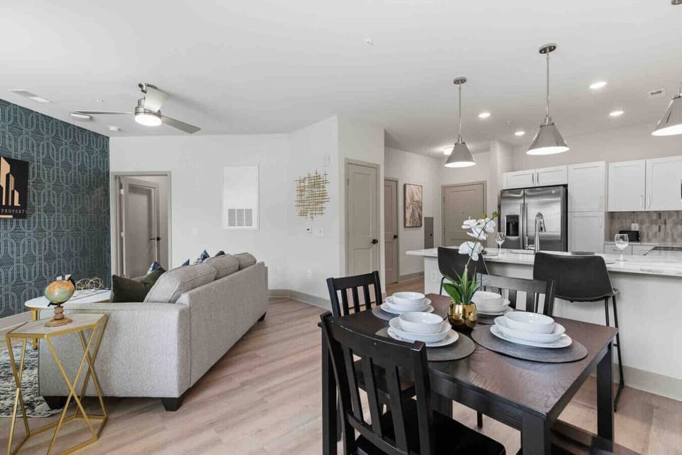 The Perfect Open-Concept Layout-Enjoy the seamless flow of this modern space. The open design connects the living room, dining area, and kitchen, making it perfect for socializing and relaxing.