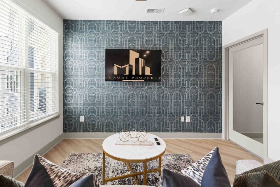 A Modern & Relaxing Living Space-Kick back and relax in our stylish open-concept living room. The comfortable sofa and sleek decor are perfect for unwinding after a long day.