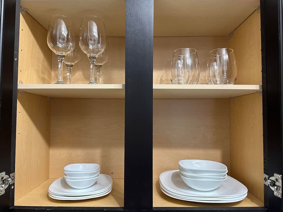 A Well-Stocked Kitchen-Don`t worry about bringing your own! Our kitchen is fully stocked with plates, bowls, wine glasses, and tumblers for all your dining needs.